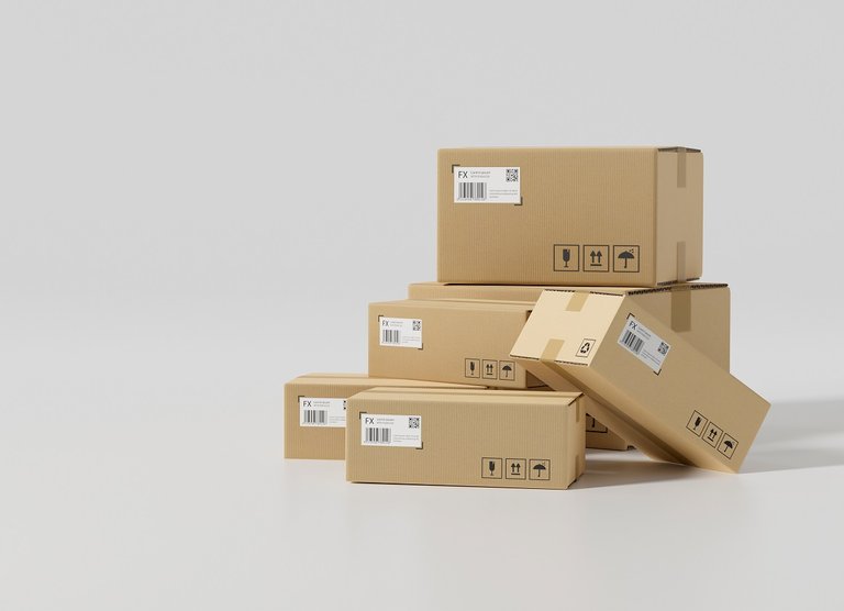 Cardboard Boxes With Fragile Tags In White Background With Copy Space
